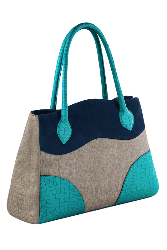 Natural beige and navy blue women's dress handbag, matching pumps and belts. Worn view - Florence KOOIJMAN